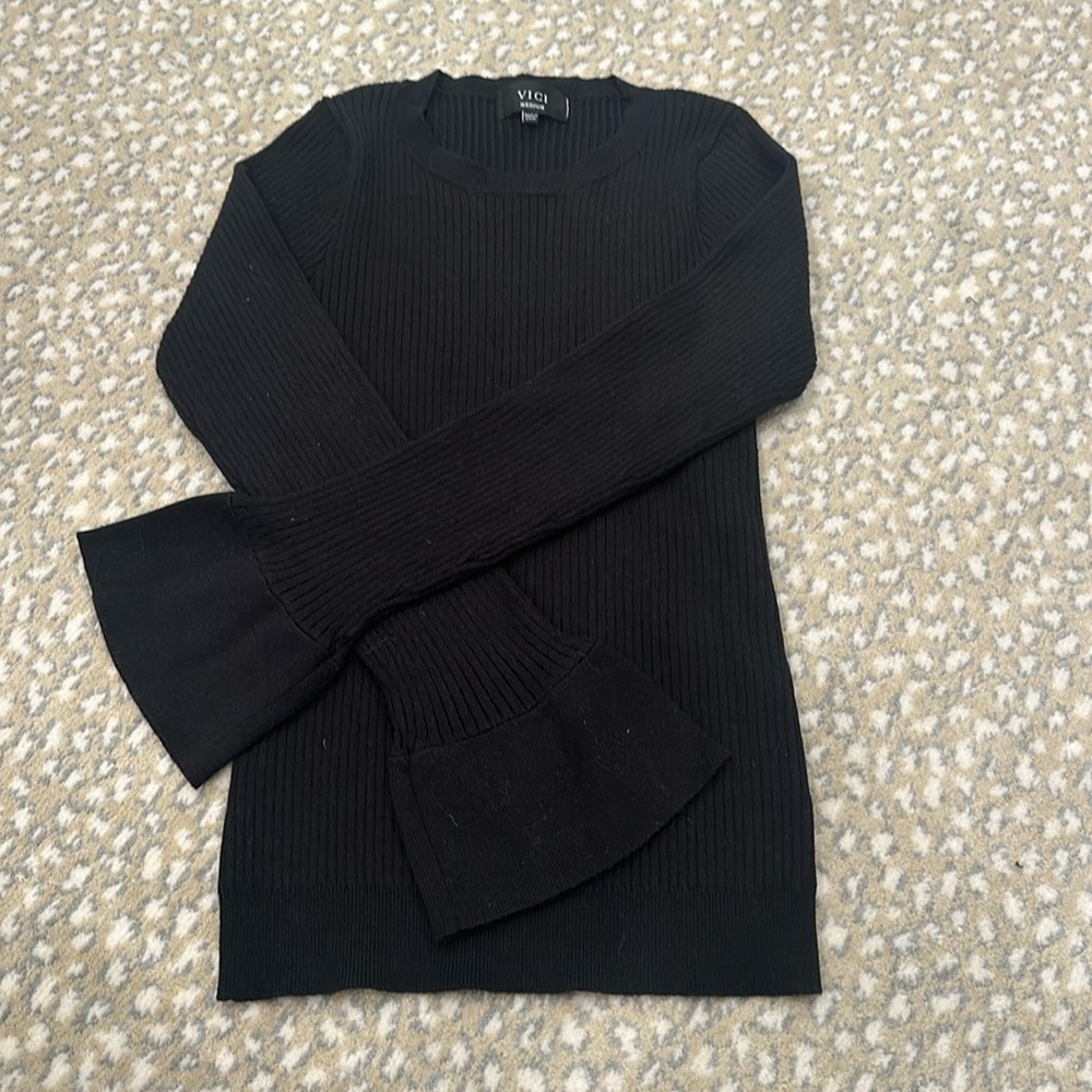 Women’s black stretchy sweater top with bell sleeves, size medium